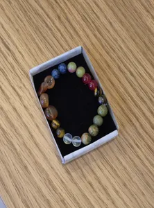 تجریه خرید دستبند مدل سنگ ماه تولد تیر کد 1122