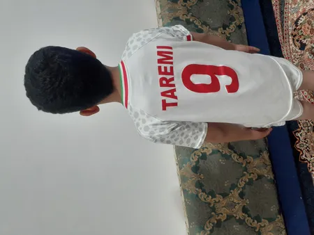 ست تی شرت آستین کوتاه و شلوارک ورزشی پسرانه طرح تیم ملی ایران مدل جام جهانی کد 2022