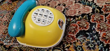 قلک طرح اسباب بازی تلفن و ماشین