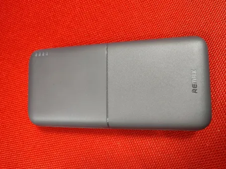 پاوربانک 12 وات ریمکس مدل RPP-26 ظرفیت 20000 میلی آمپر ساعت