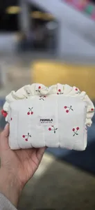 تجریه خرید کیف لوازم آرایش زنانه مدل آلبالو چین دار