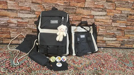 کوله پشتی یی سی یوان مدل 001 به همراه جامدادی و کیف دستی مجموعه 5 عددی