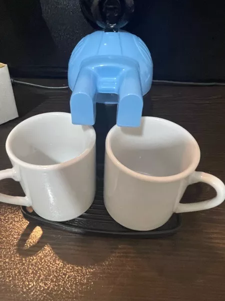 قهوه جوش مدل روگازی طرح عروسکی به همراه فنجان