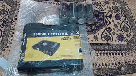 اجاق سفری مدل AS به همراه دو عدد کپسول گاز سفری
