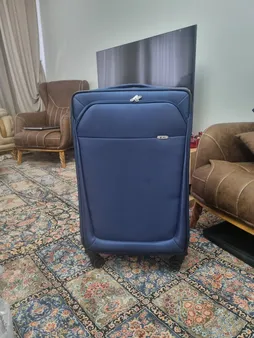 چمدان نیلپر مدل آوان کد 700678 - 111 سایز بزرگ ارتفاع 77 سانتی متر