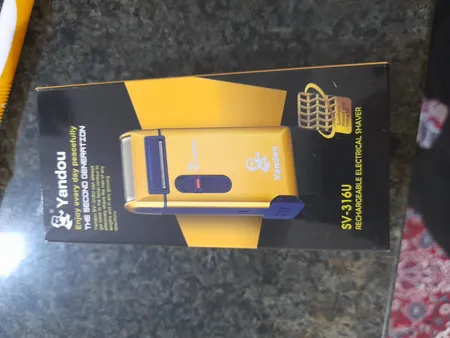 ماشین اصلاح موی صورت یاندو مدل SV-316U به همراه تیغه و توری یدک