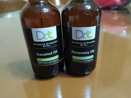 روغن مو دکترتی مدل رزماری حجم 50 میلی لیتر به همراه روغن مو دکترتی مدل نارگیل حجم 50 میلی لیتر