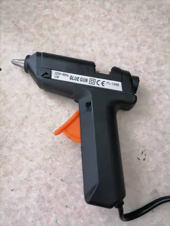 دستگاه چسب تفنگی جانسون مدل FL-138B به همراه یک عدد چسب حرارتی جانسون بصورت رایگان