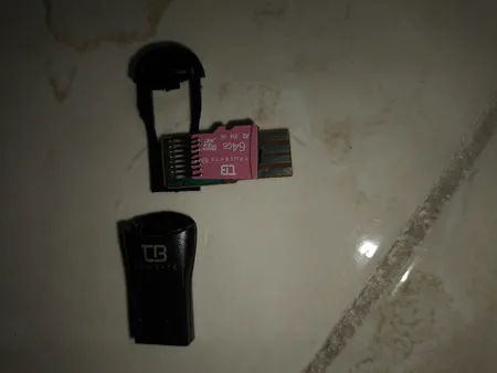 کارت حافظه microSD XC تروبایت مدل 633X-A2-V30 کلاس 10 استاندارد UHS-I U3 سرعت 95MBps ظرفیت 64 گیگابایت به همراه کارت‌خوان