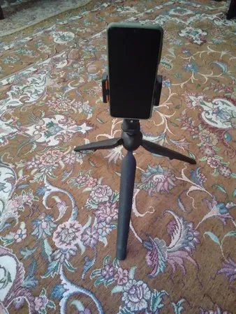 پایه نگهدارنده گوشی موبایل یونیمات مدل D-909 II