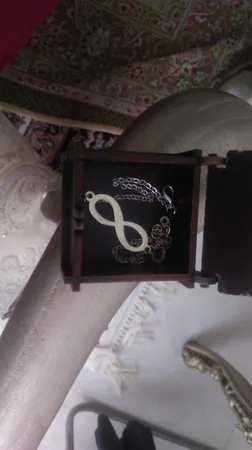 پابند نقره زنانه مدل بی نهایت