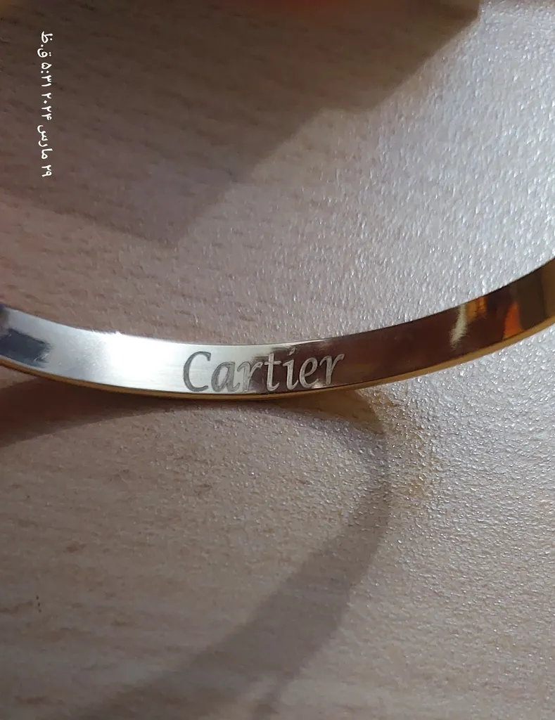 دستبند النگویی طلا 18 عیار زنانه مدل 57016 طرح پیچ