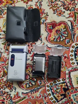 ماشین اصلاح موی صورت یاندو مدل Sv-w301u به همراه تیغه و توری یدک