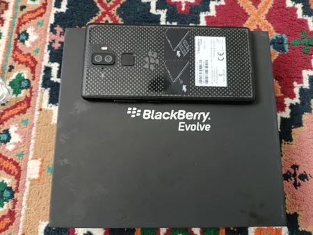گوشی موبایل بلک بری مدل Evolve BBG100-1 دو سیم‌ کارت ظرفیت 64 گیگابایت