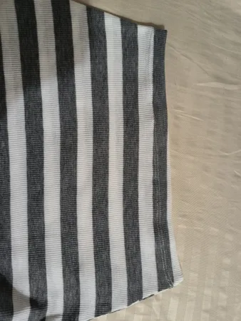 ست کراپ  تاپ و دامن زنانه دل آویز مدل H355