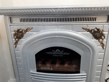 بخاری گازی شایسته طرح شومینه مدل کلاسیک