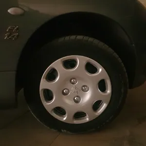 تجریه خرید قالپاق چرخ تی پی ای مدل TPA-P06 سایز 14 اینچ مناسب برای پژو 206