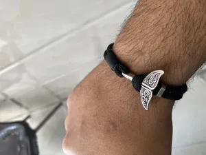 تجریه خرید دستبند مدل دم وال طرح سیاه قلم  کد 3055