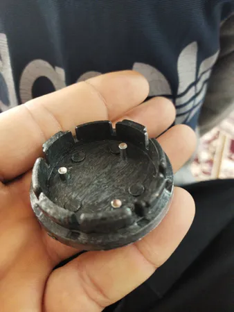 درپوش رینگ خودرو آراکس یدک مدل AY-1019  مناسب برای کوییک