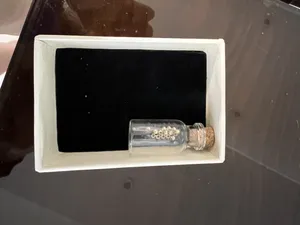 تجریه خرید طلا گرمی 18 عیار ناریا مدل گوی البرناردو بسته 15 عددی