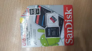 تجریه خرید کارت حافظه microSDXC سن دیسک مدل Ultra A1 کلاس 10 استاندارد UHS-I سرعت 100MBps ظرفیت 64 گیگابایت به همراه آداپتور