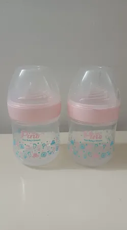 شیشه شیر پینو بیبی مدل Natural sense کد M 0-6 ظرفیت 150 میلی لیتر