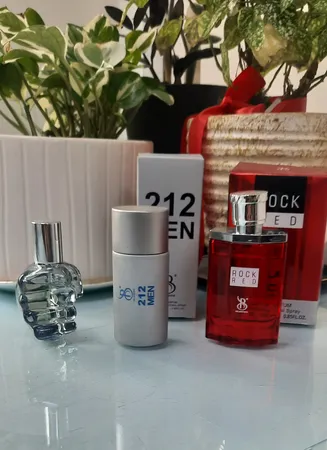 عطر جیبی مردانه برندینی مدل راک رد حجم 25 میلی لیتر