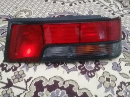 چراغ خطر عقب سمت راست جمع ساز کد 165 مناسب برای پژو آردی