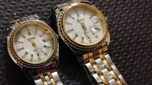 تجریه خرید ست ساعت مچی زنانه و مردانه اسکمی مدل  9098 کد 02