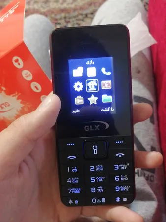 گوشی موبایل جی ال ایکس مدل iT5606 دو سیم کارت ظرفیت 32 مگابایت و رم 32 مگابایت