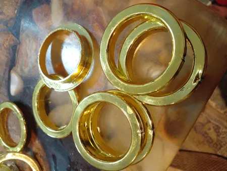 حلقه چوب پرده مدل پانچ  کد 65 بسته 9 عددی