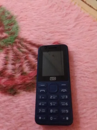 گوشی موبایل تی سی اچ مدل ARC دو سیم‌کارت ظرفیت 4 مگابایت