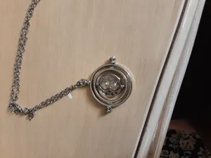 تجریه خرید گردنبند مدل زمان برگردان هری پاتر کد j-10990
