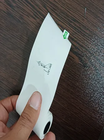 رول کاغذ پرینتر حرارتی مدل پشت چسبدار