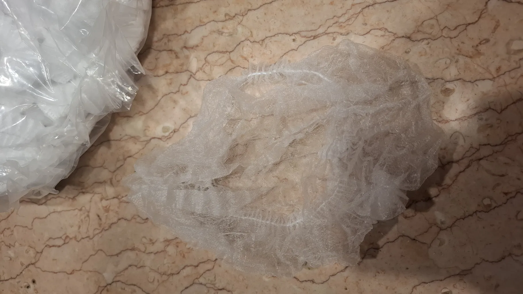 کلاه یکبار مصرف مدل 01 بسته 100 عددی