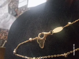 تجریه خرید دستبند زنجیری طلا 18 عیار زنانه طلای مستجابی مدل البرنادو کد 03