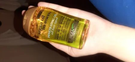 روغن مو او جی ایکس مدل آرگان مراکشی حجم 100 میلی لیتر