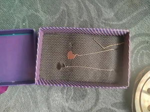 تجریه خرید گوشواره طلا 18 عیار زنانه مدل قلب کد 99L