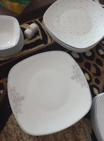 سرویس غذاخوری 27 پارچه چینی زرین ایران سری کواترو مدل مونت کارلو پلاتینی درجه عالی