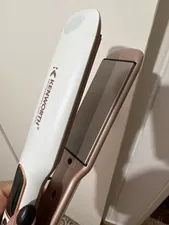 تجریه خرید اتو مو کنورث مدل kw313 به همراه فر کننده مو