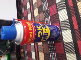 اسپری روان کننده اوکی مدل WD-40 حجم 450 میلی لیتر