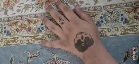 اسپری تتو موقت مدل R001 حجم 100 میلی لیتر به همراه تتو موقت