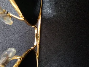 تجریه خرید عینک آفتابی مردانه ری بن مدل 3026 L2846-62