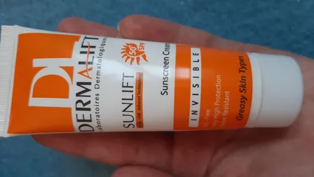 کرم ضدآفتاب بی‌رنگ درمالیفت مدل SPF50، مناسب پوست‌های چرب، حجم 40 میلی‌لیتر