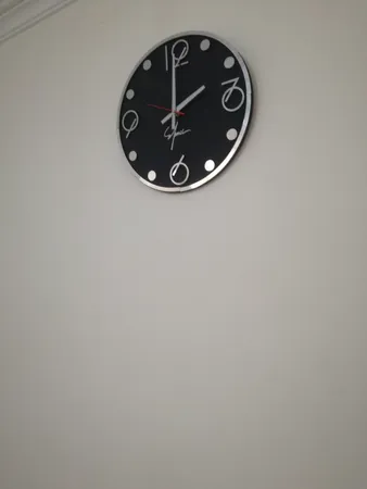 ساعت دیواری اِلِنسی مدل SD025