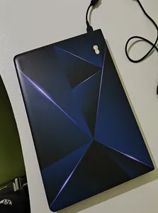 تجریه خرید استیکر لپ تاپ توییجین و موییجین طرح هندسی کد 41 مناسب برای لپ تاپ 15.6 اینچ به همراه برچسب حروف فارسی کیبورد