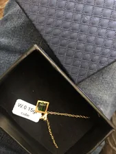 تجریه خرید گردنبند طلا 18 عیار زنانه ناریا مدل مکعب رنگ سبز