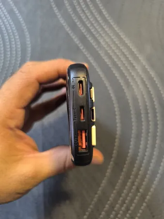 پاوربانک 22.5 وات نیوماین مدل AL28 ظرفیت 10000 میلی آمپر ساعت