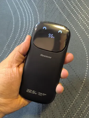 پاوربانک 22.5 وات نیوماین مدل AL28 ظرفیت 10000 میلی آمپر ساعت