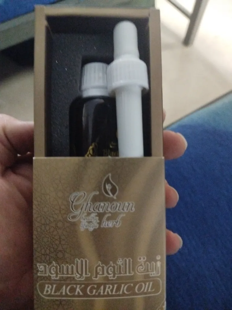 سرم مو قانون مدل سیر سیاه حجم 30 میلی لیتر